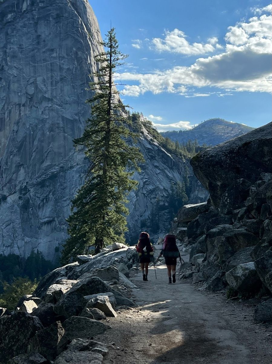 2 people hiking through yosemite