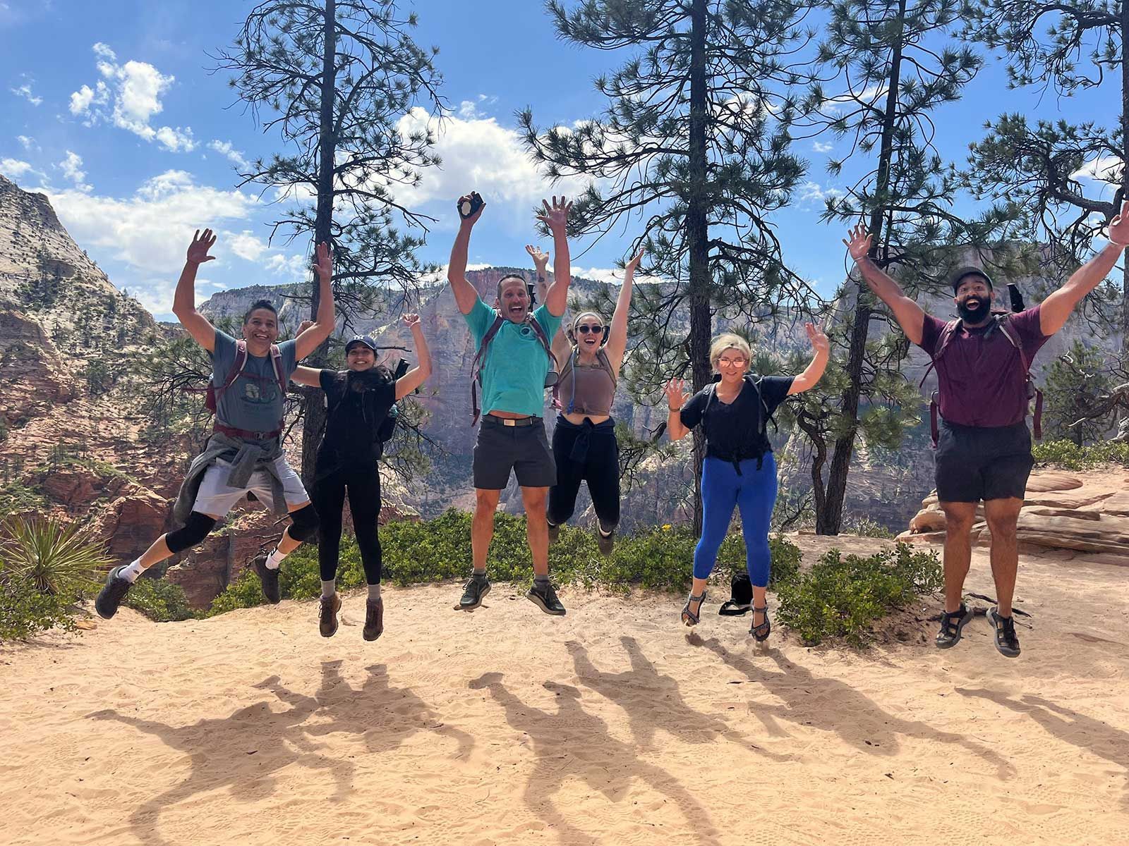 People jump for joy in Bryce Canyon National Park