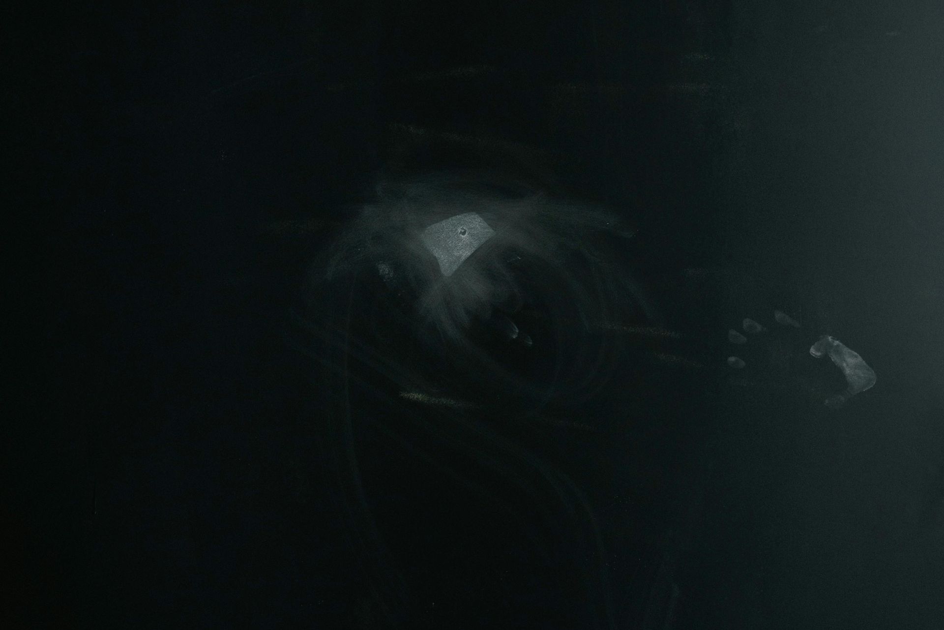 A dark tunnel with a light at the end of it.