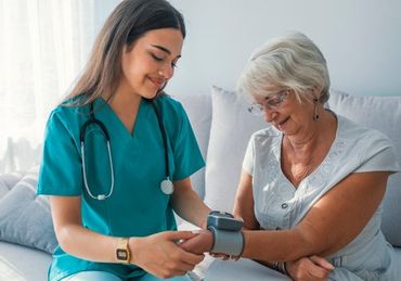 Woman Measuring Blood Pressure — Plano, TX — UBP Insurance