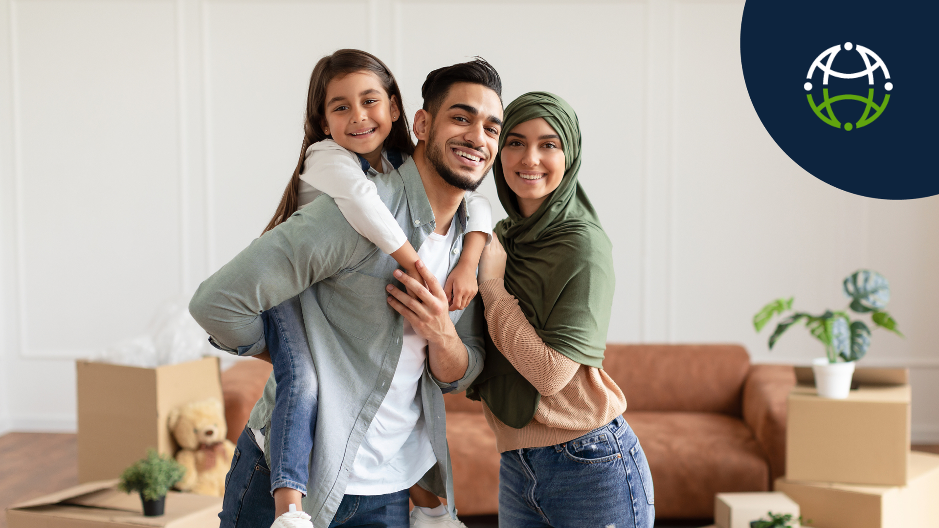 family in room with moving boxes