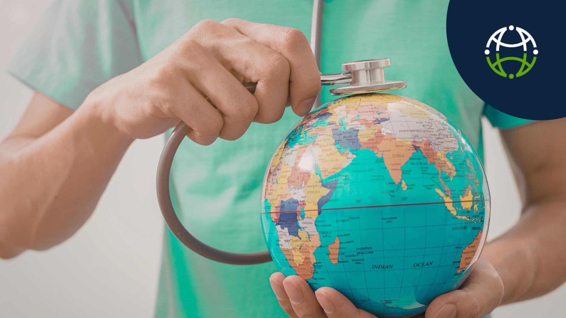 Nurse hands holding stethoscope to globe. 