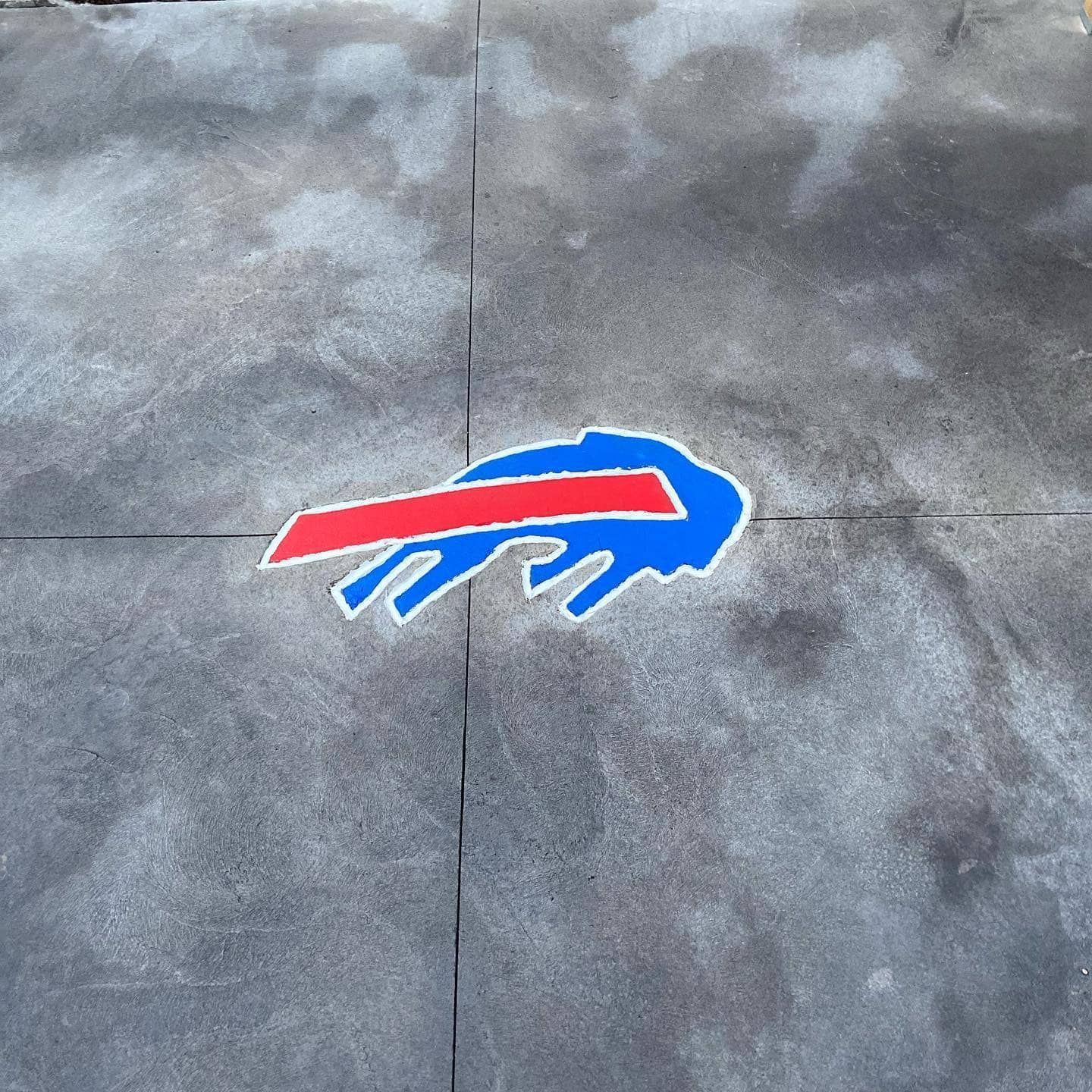 Buffalo Bills logo painted on concrete.