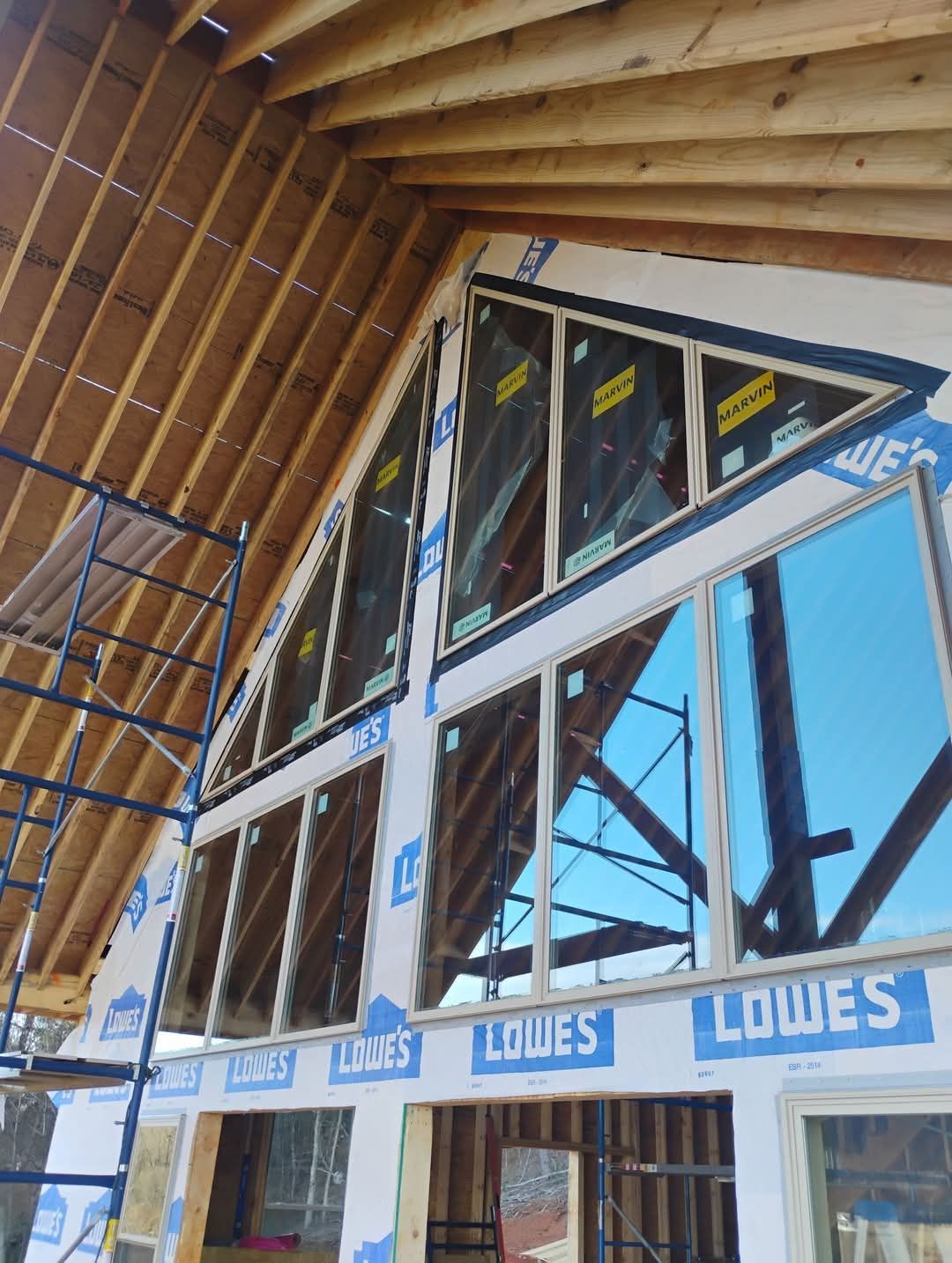 A building under construction with a sign that says lowes