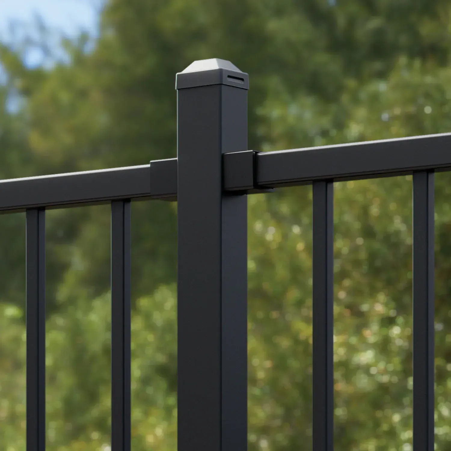 Two-story brick house with large windows, arched entryway, and green lawn on a sunny day.