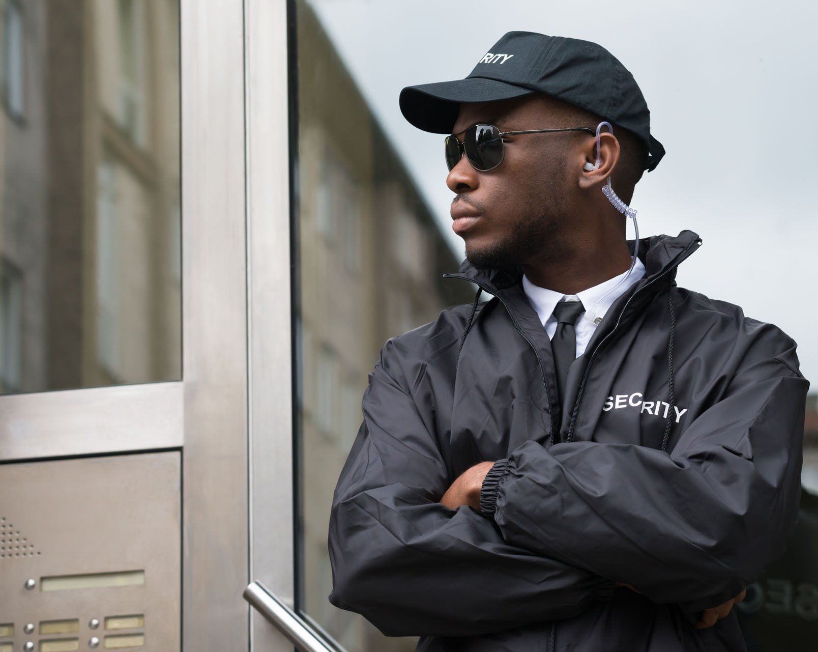 A close-up view of a security guard protecting a building entrance