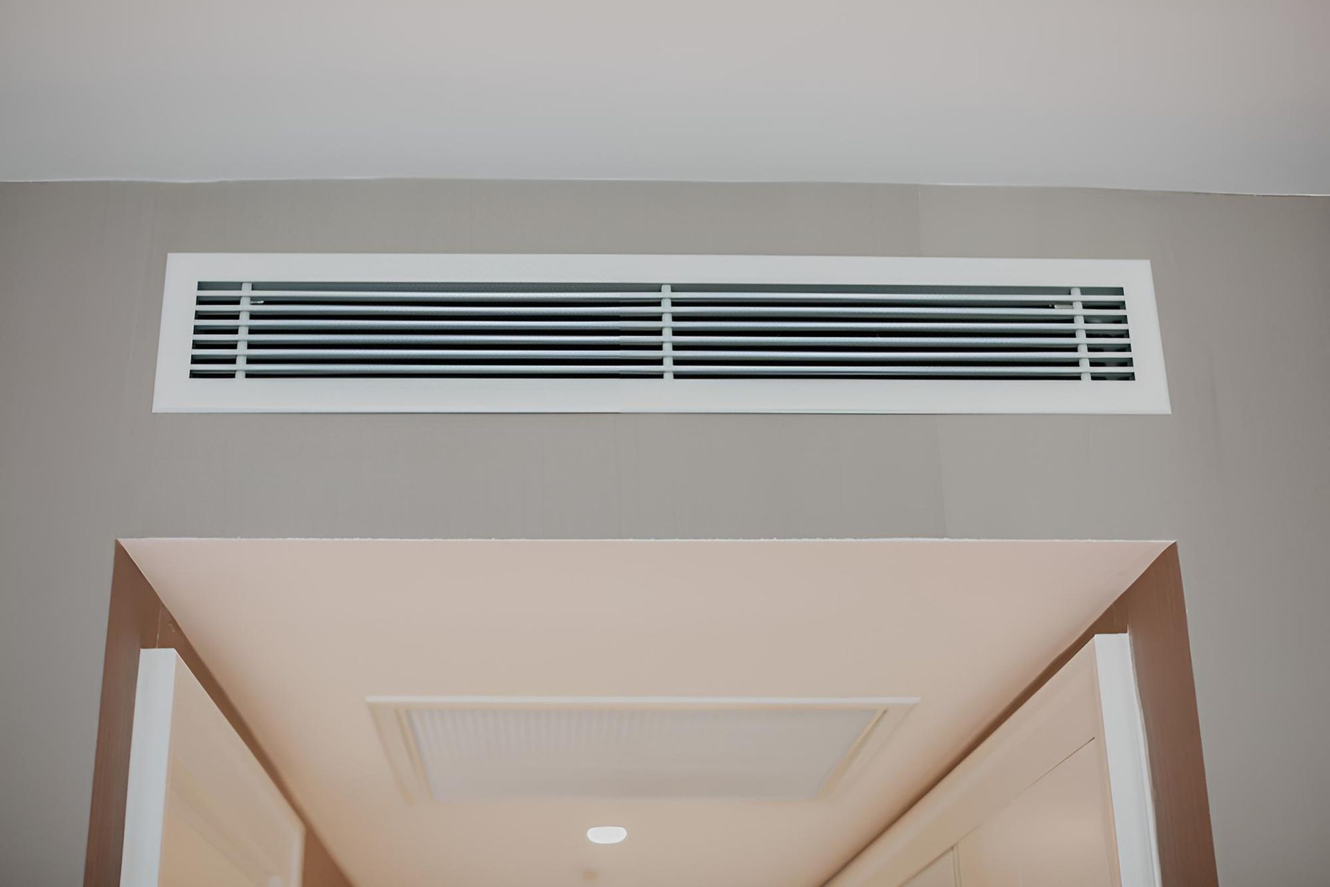White Ducted Air Condition is Hanging From the Ceiling — Coolman Airconditioning in Broken Head, NSW