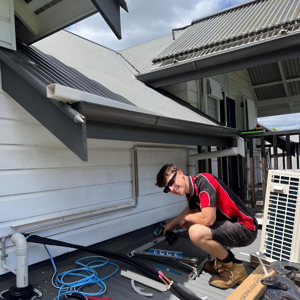 Man Repairing Aircon — Coolman Airconditioning in Broken Head, NSW