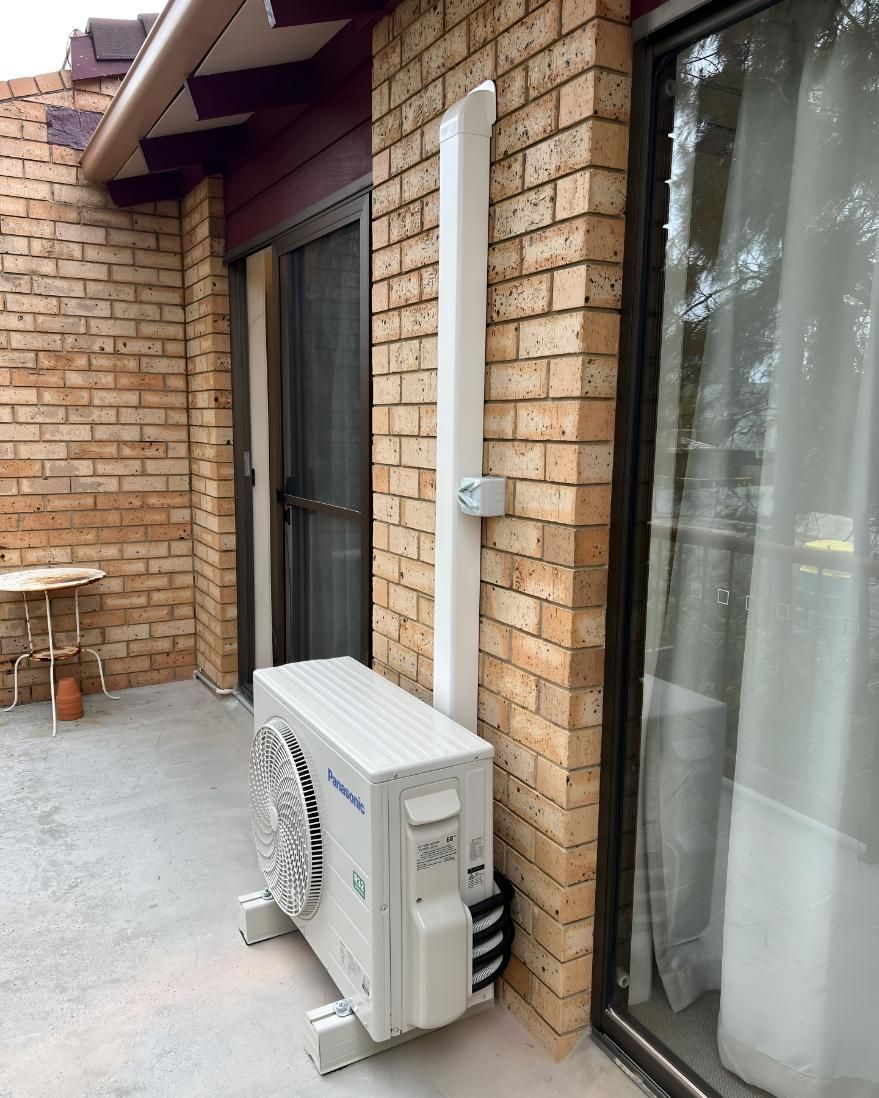 White Air Conditioner — Coolman Airconditioning in Broken Head, NSW