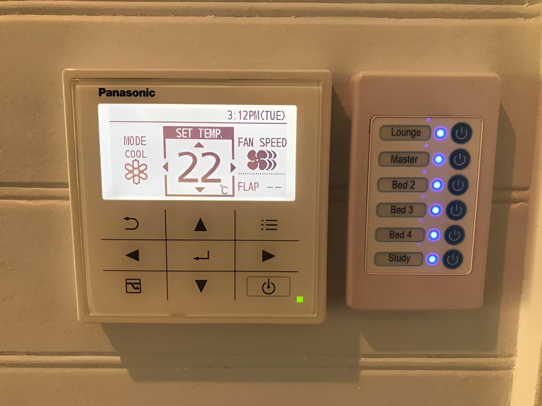 Panasonic Thermostat is Mounted on a Wall — Coolman Airconditioning in Wollongbar, NSW
