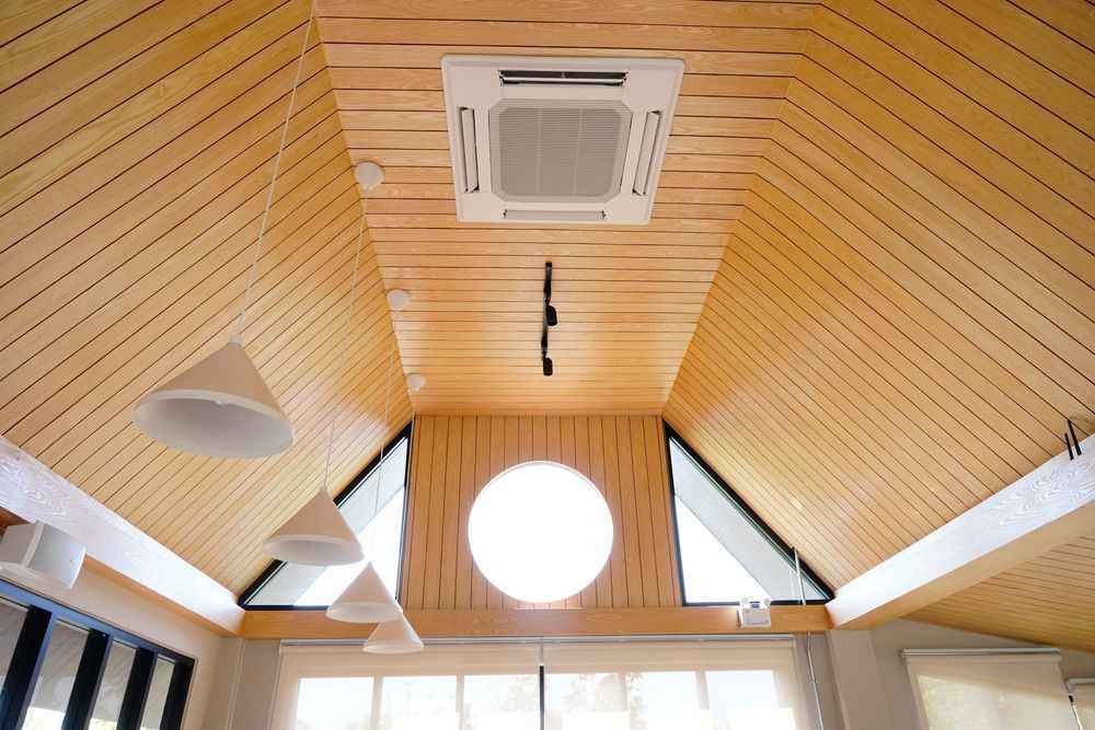 Room With a Wooden Ceiling and a Ceiling Fan — Coolman Airconditioning in Broken Head, NSW