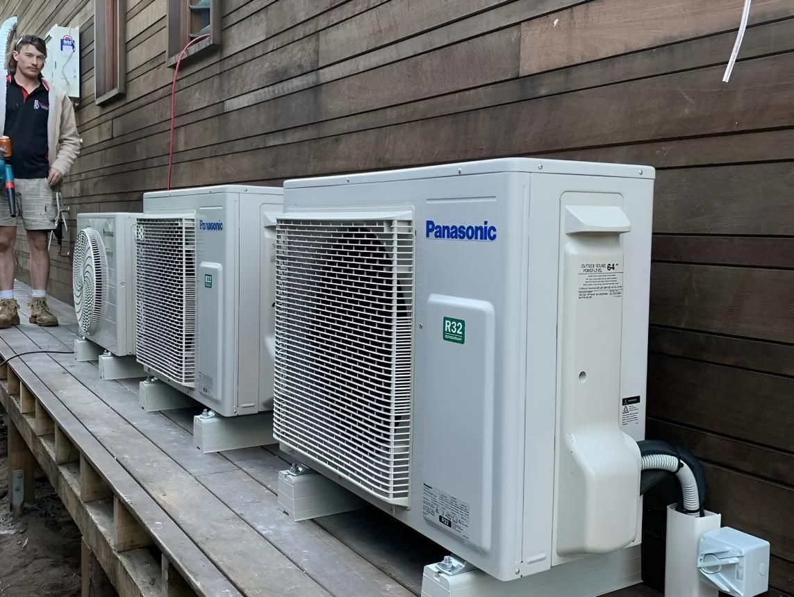 Air Conditioners on a Wooden Deck — Coolman Airconditioning in Broken Head, NSW