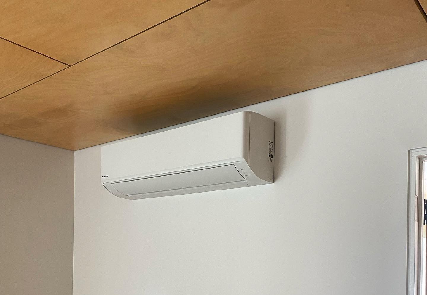 White Air Conditioner is Hanging From the Ceiling — Coolman Airconditioning in Broken Head, NSW