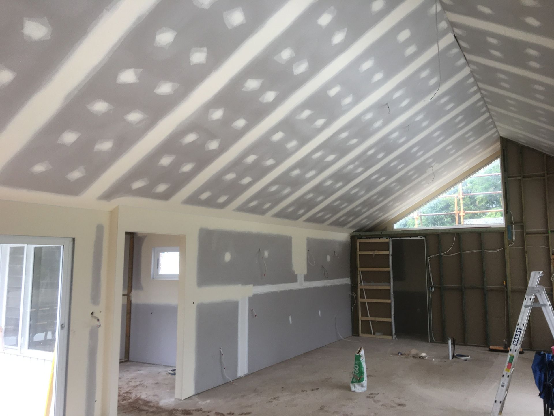 Interior of A Room Under Construction with Drywall — Completely Plastered North Coast in Lennox Head, NSW