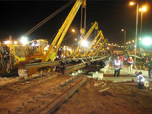 Hulcher sidebooms work on a retarder installation project