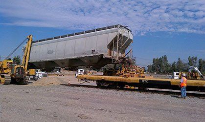 Railroad & Mechanical Tie Down Hopper Cars