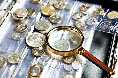 Coins and Magnifying Glass — Atascadero, CA — Atascadero Jewelry and Loan