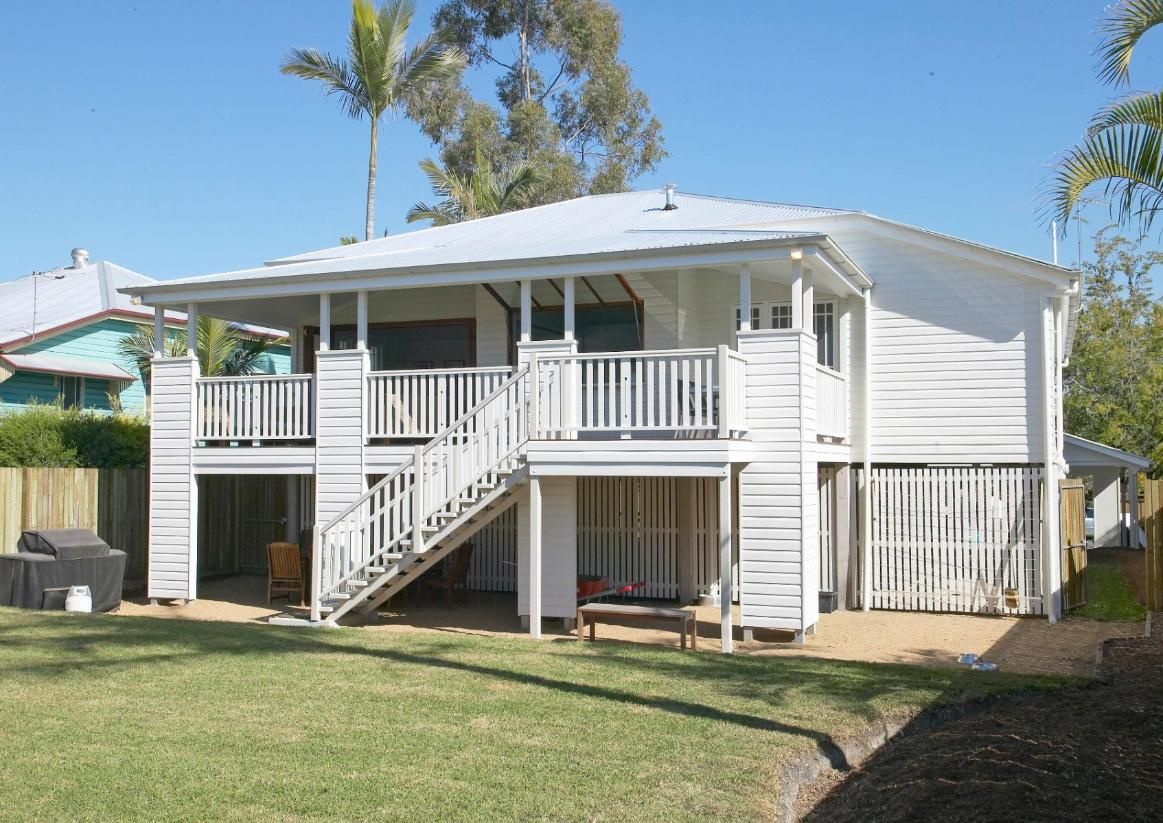 A Large White House With Stairs Leading Up to the Second Floor — Pro-Jax Pty Ltd in Bohle, QLD