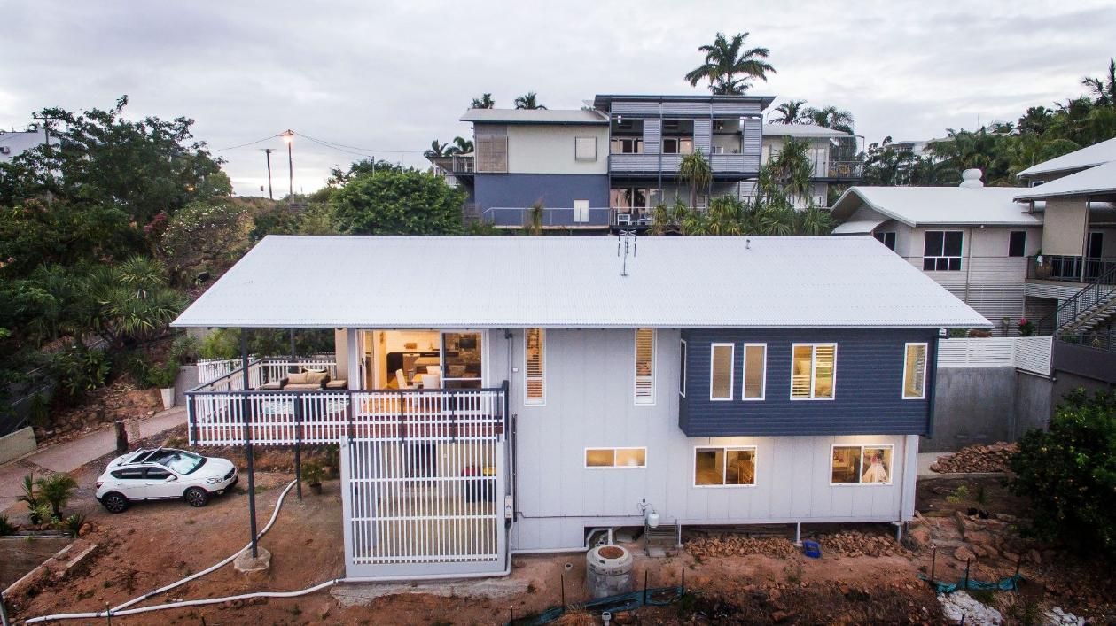 An Aerial View of a House With a Car Parked in Front of It — Pro-Jax Pty Ltd in Bohle, QLD