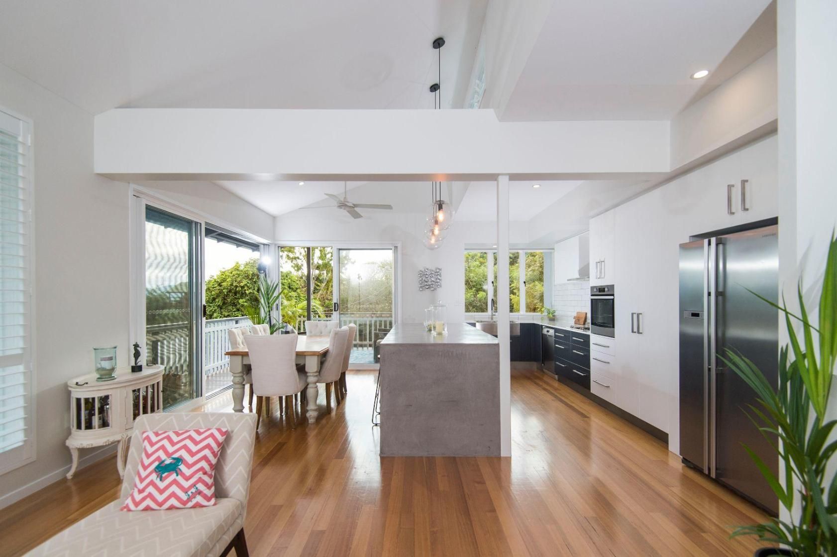A Kitchen and Dining Room in a House With Stainless Steel Appliances — Pro-Jax Pty Ltd in Bohle, QLD