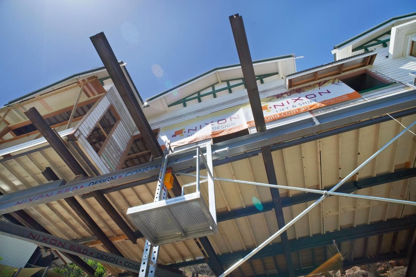 A Building Under Construction With a Sign That Says Nixon on It — Pro-Jax Pty Ltd in Bohle, QLD