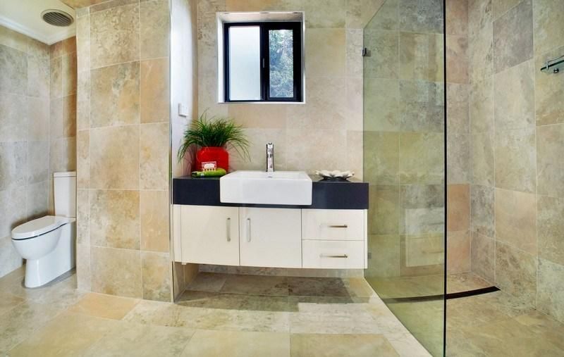 A Bathroom With a Sink, Toilet, and Walk in Shower — Pro-Jax Pty Ltd in Bohle, QLD