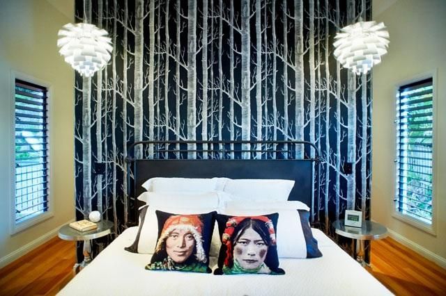 A Bedroom With a Bed and Two Pillows on It — Pro-Jax Pty Ltd in Bohle, QLD