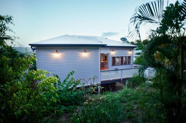 A White House is Surrounded by Trees and Bushes — Pro-Jax Pty Ltd in Bohle, QLD