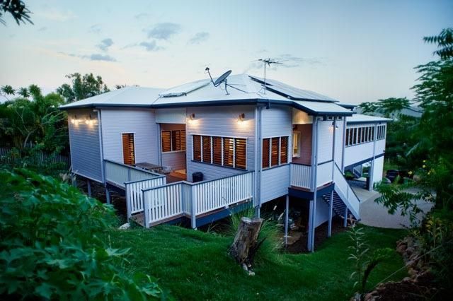 A White House With a Satellite Dish on Top of It — Pro-Jax Pty Ltd in Bohle, QLD