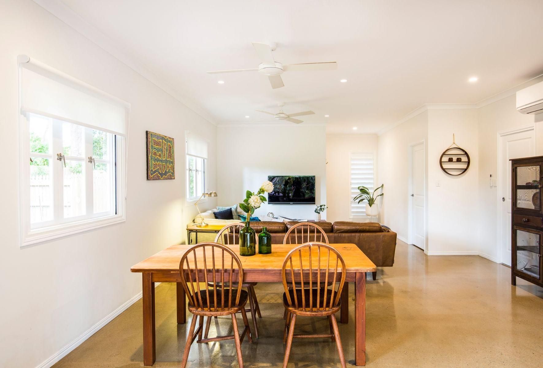 There is a Dining Table and Chairs in the Middle of the Room — Pro-Jax Pty Ltd in Bohle, QLD