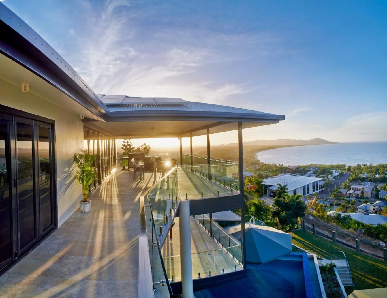 There is a Balcony With a View of the Ocean and Mountains — Pro-Jax Pty Ltd in Bohle, QLD