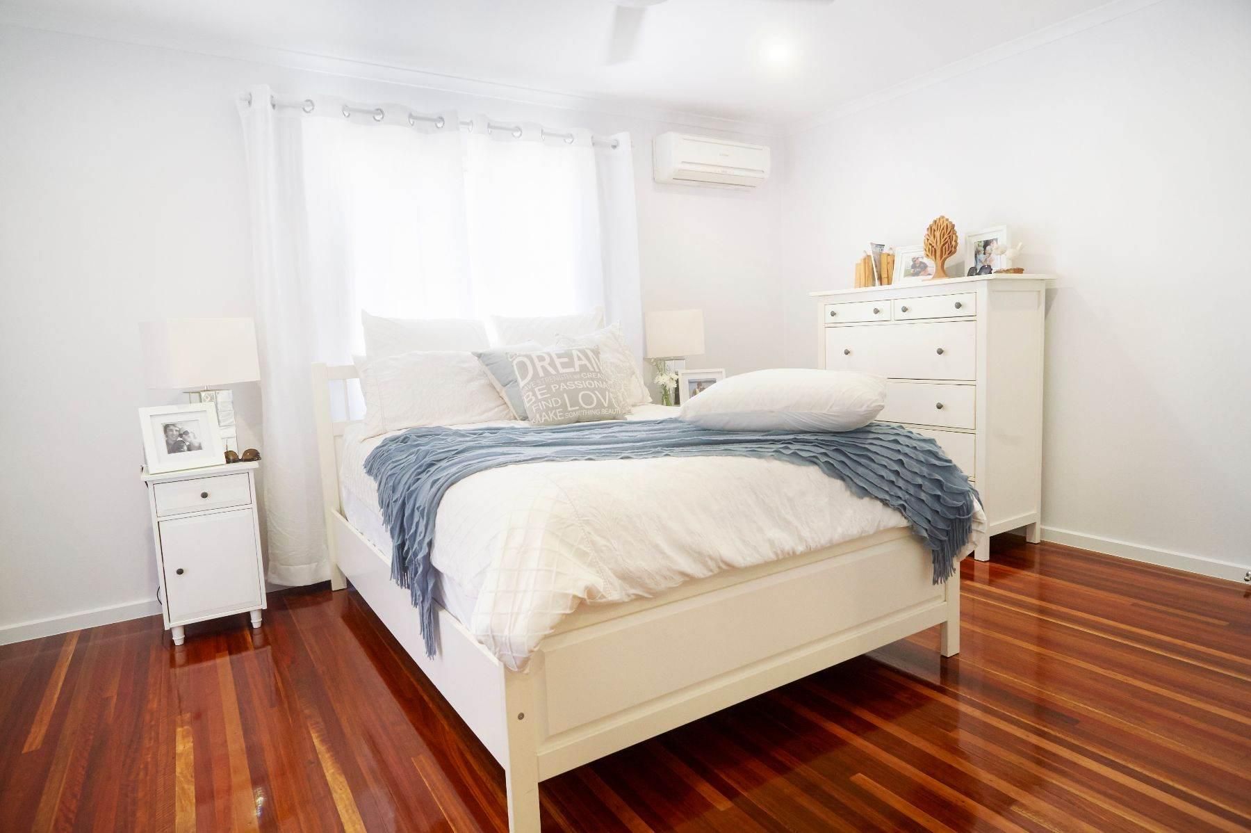 A Bedroom With a Bed, Dresser, Nightstands and a Window — Pro-Jax Pty Ltd in Bohle, QLD