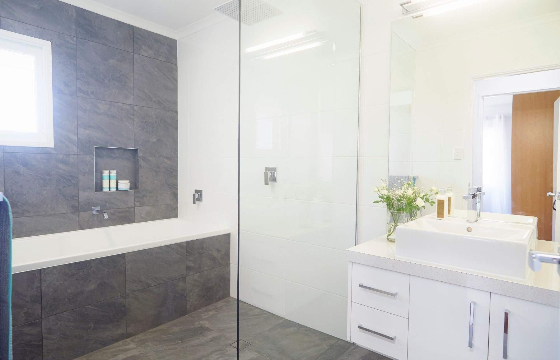 A Bathroom With a Walk in Shower, Sink, and Bathtub — Pro-Jax Pty Ltd in Bohle, QLD