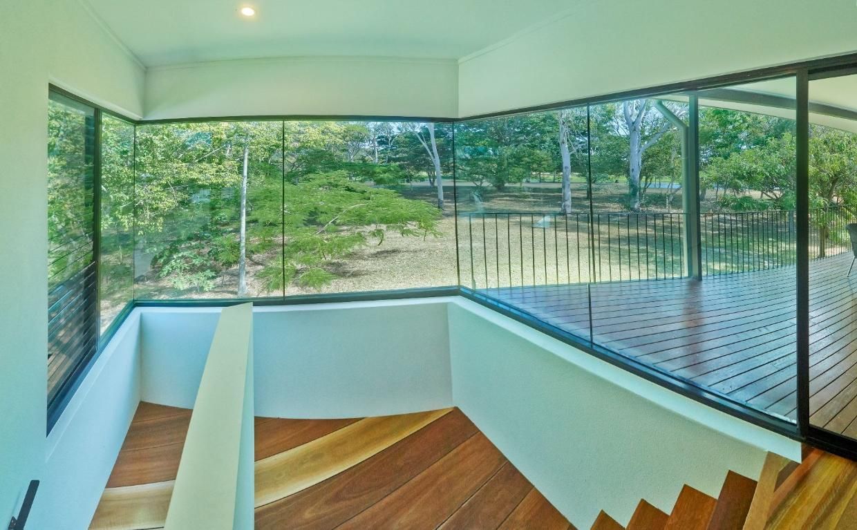 The Stairs Are Made of Wood and the Windows Are Made of Glass — Pro-Jax Pty Ltd in Bohle, QLD