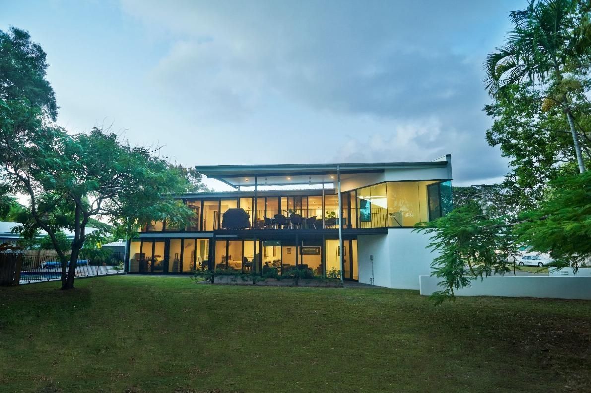 A Large House With a Lot of Windows is Surrounded by Trees — Pro-Jax Pty Ltd in Bohle, QLD