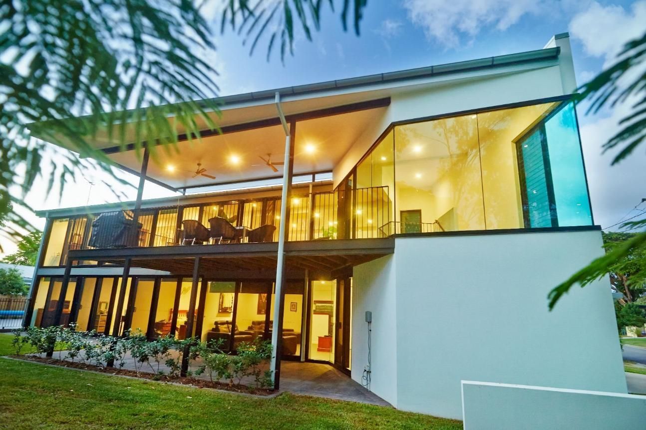 A Large White House With a Lot of Windows and a Balcony — Pro-Jax Pty Ltd in Bohle, QLD