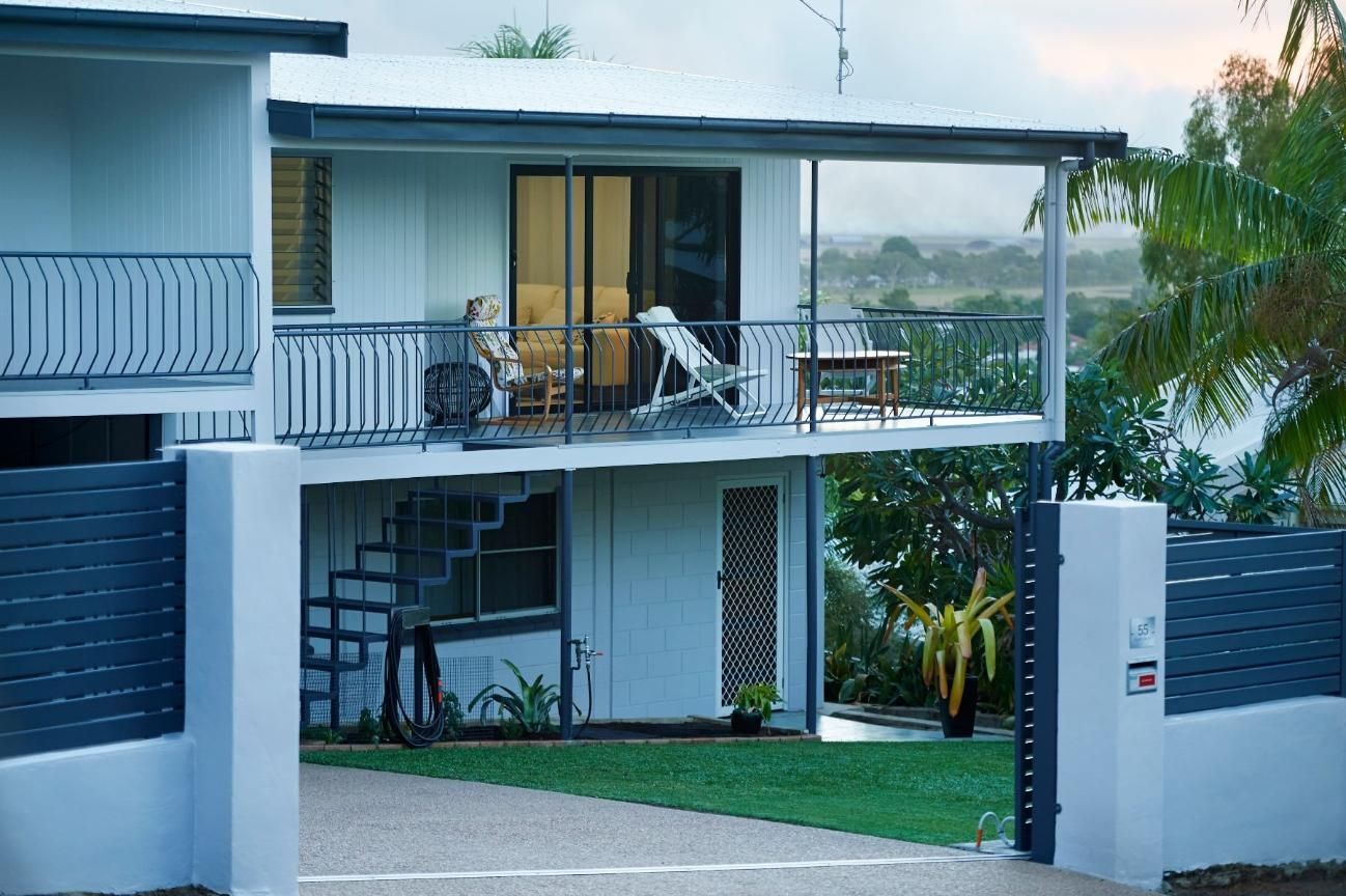 A White House With a Balcony and Stairs — Pro-Jax Pty Ltd in Bohle, QLD