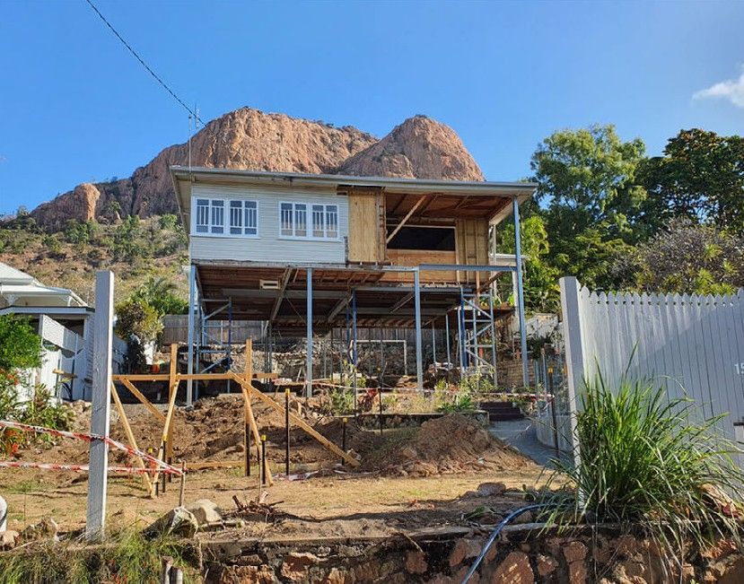 House Under Construction on Stilts, With a Mountain in the Background — Pro-Jax Pty Ltd in Bohle, QLD