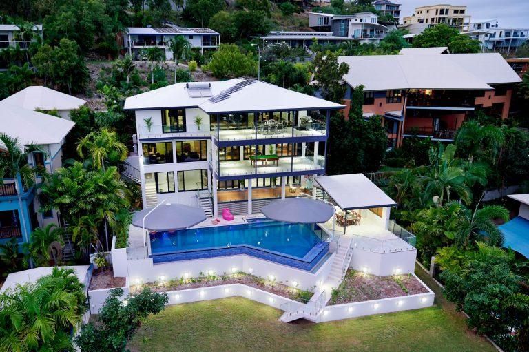 An Aerial View of a Large House With a Swimming Pool — Pro-Jax Pty Ltd in Bohle, QLD