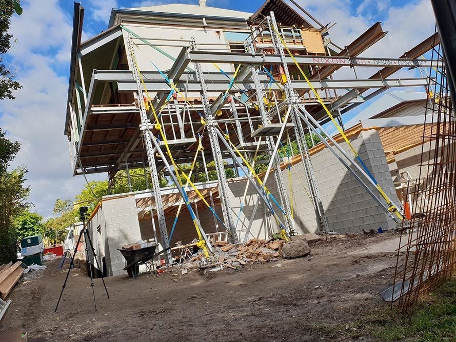 A House Under Renovation, Supported by Scaffolding — Pro-Jax Pty Ltd in Bohle, QLD