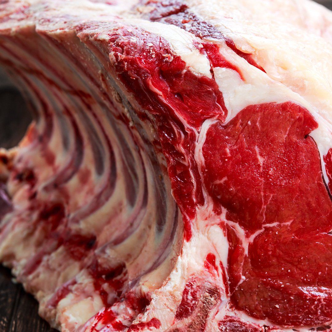 A close up of a piece of raw meat on a table