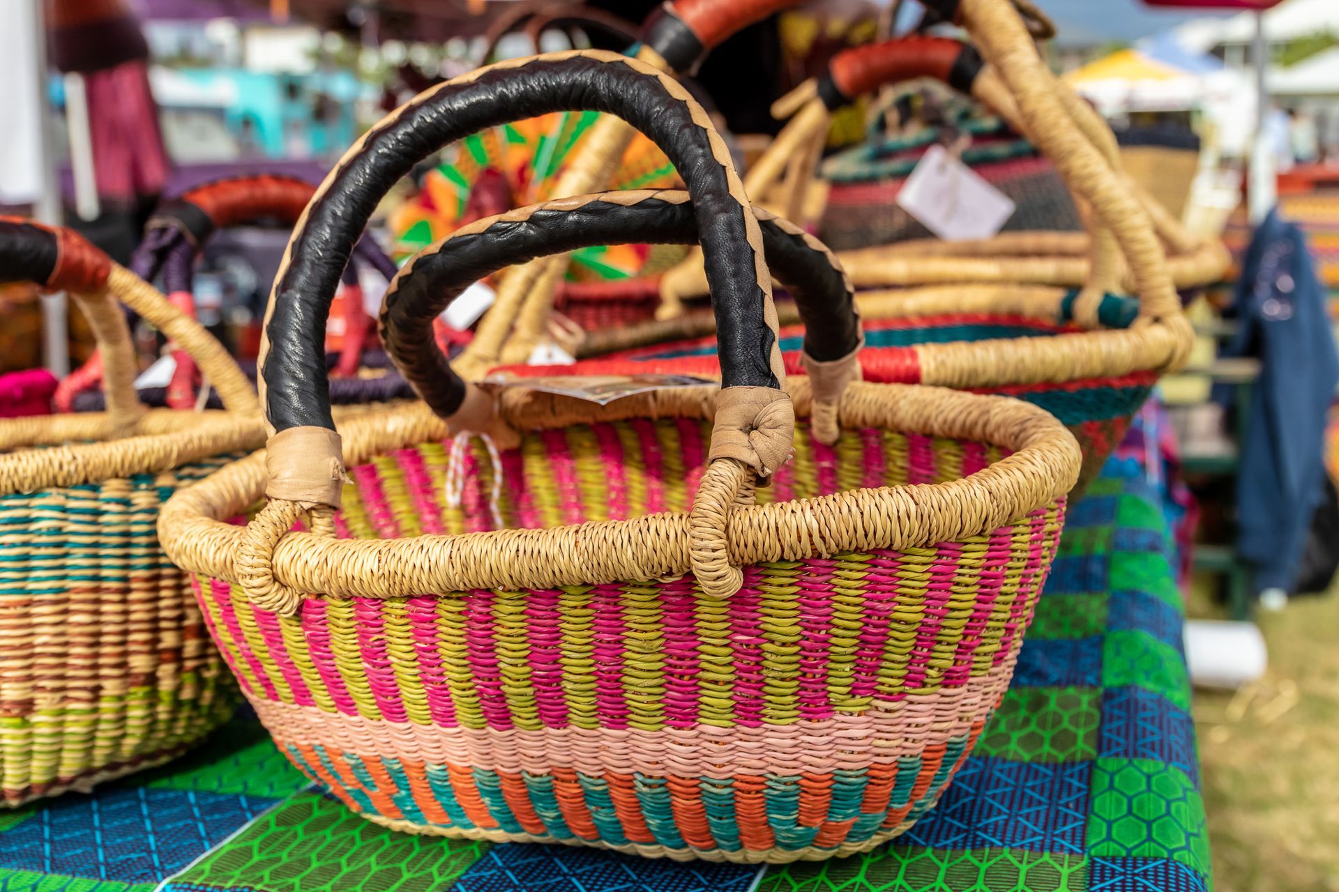 a bunch of colorful baskets are sitting on a table .