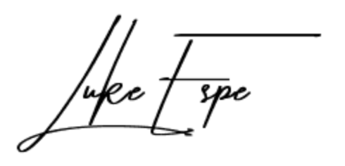 A black and white signature of a person on a white background.