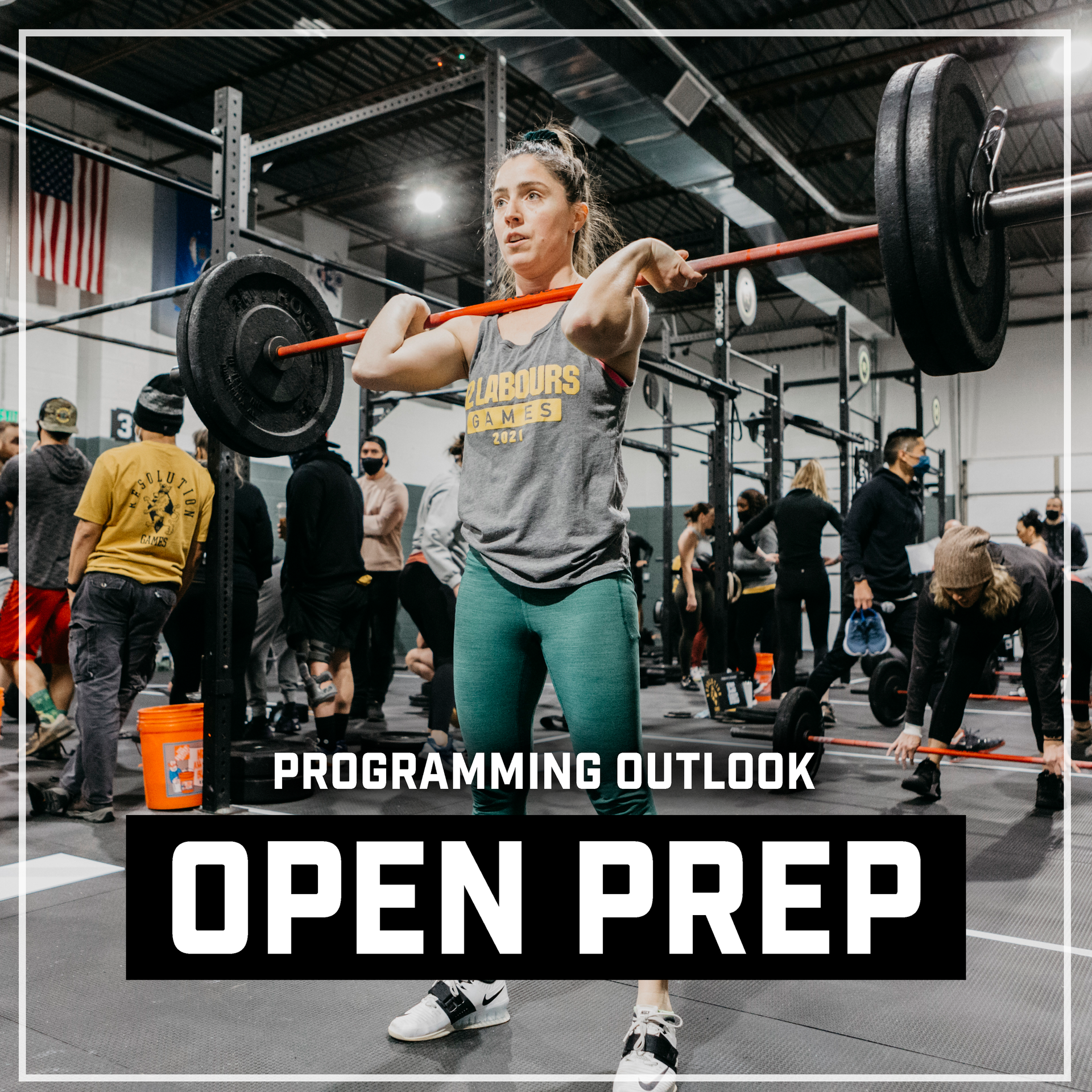 A woman is lifting a barbell in a gym.