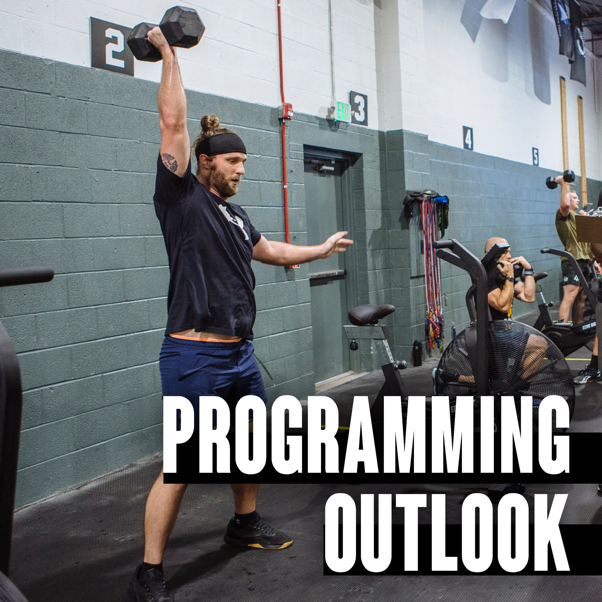 A man is lifting a dumbbell in a gym with the words programming outlook above him