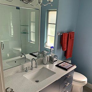 Bathroom with Red Towel — Nokomis, FL — Bay Pointe Kitchen and Bath