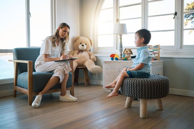 Therapist working with young child in a supportive ABA therapy session at The Skills Lab