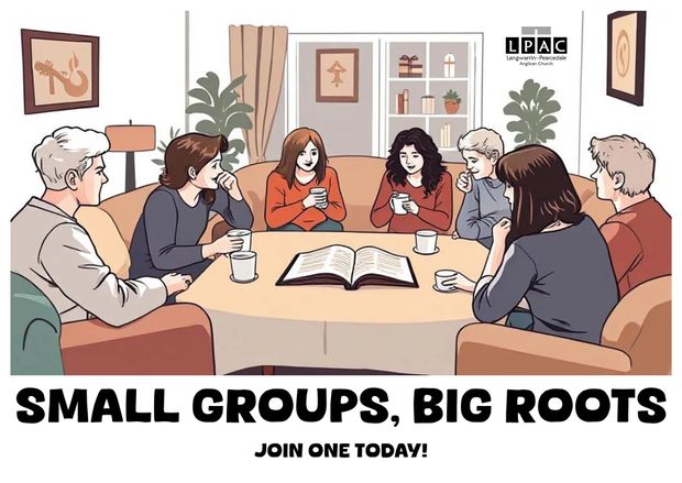 People in a living room, seated around a table, reading a book. Text: 