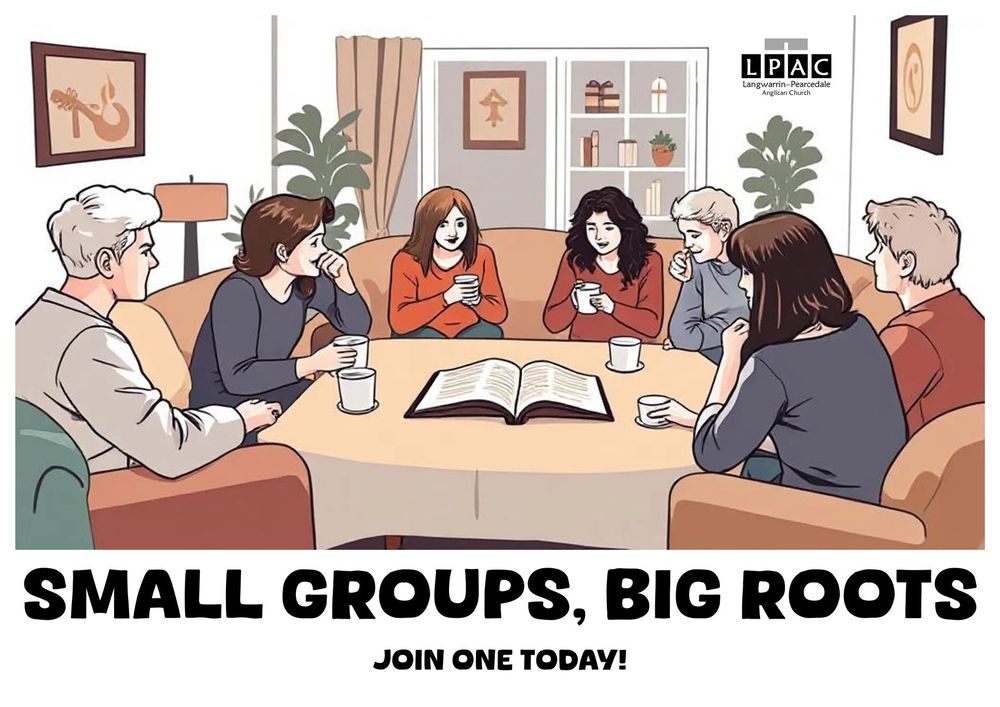 People in a living room, seated around a table, reading a book. Text: 