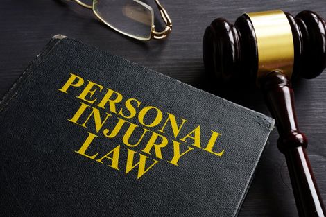 Personal Injury Law Book with Gavel — Palm Bay, FL — Roy A Alterman PA